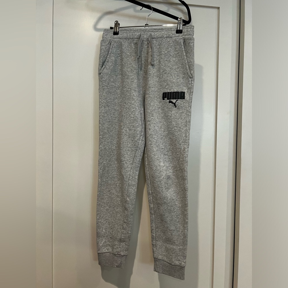 3 pr boy’s pants. 2 All in Motion black and navy sz 12/14. One Puma sz 14/16